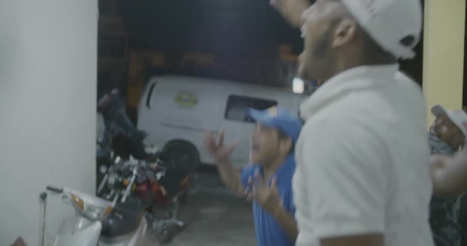 Group of men jumping up and down out of excitement