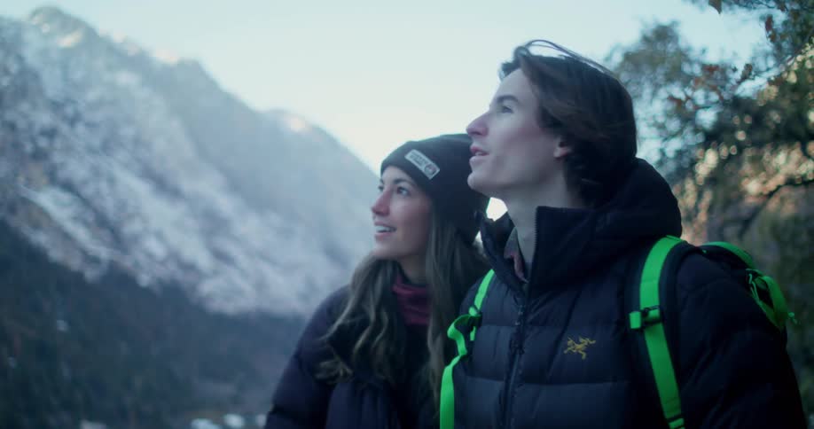 Man and woman are hiking in the mountains
