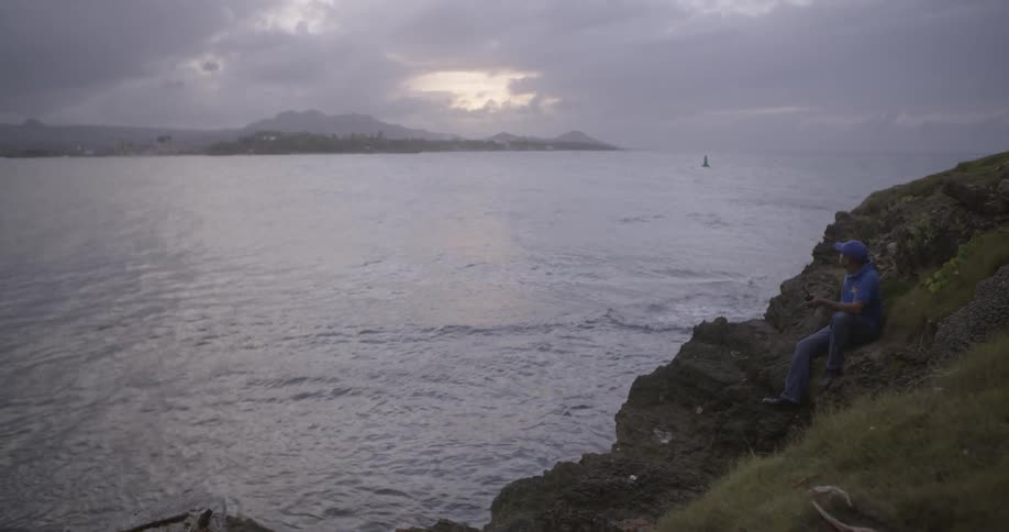 Water flows on the rocky shoreline