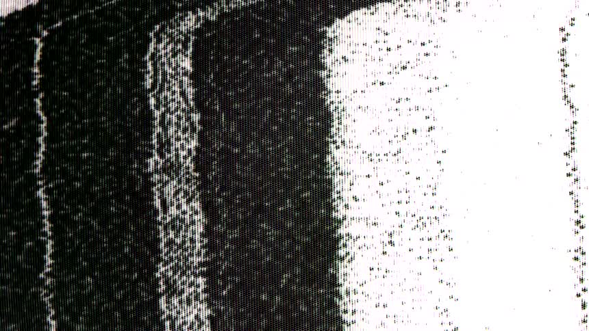High contrast black and white glitch pattern resembling tv static