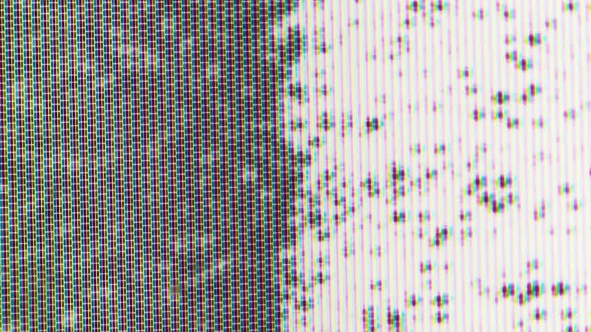 A macro shot of a malfunctioning lcd screen displaying pixel clusters