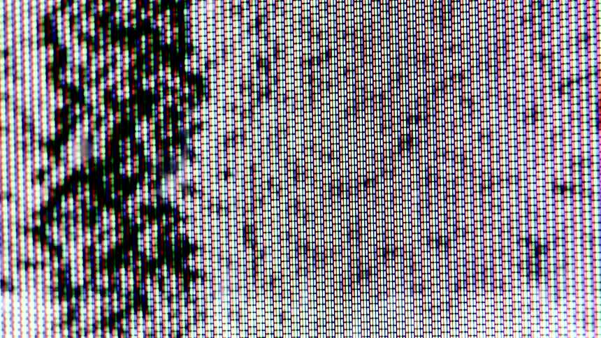Closeup of a pixelated tv screen with abstract static noise