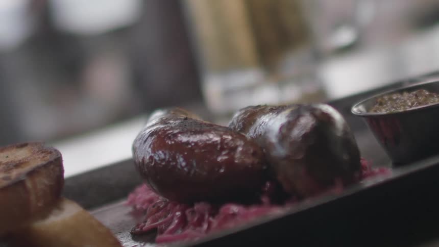 Food is served on a plate at a restaurant