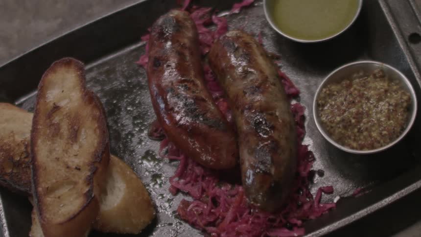 A plate of food is slid on the table