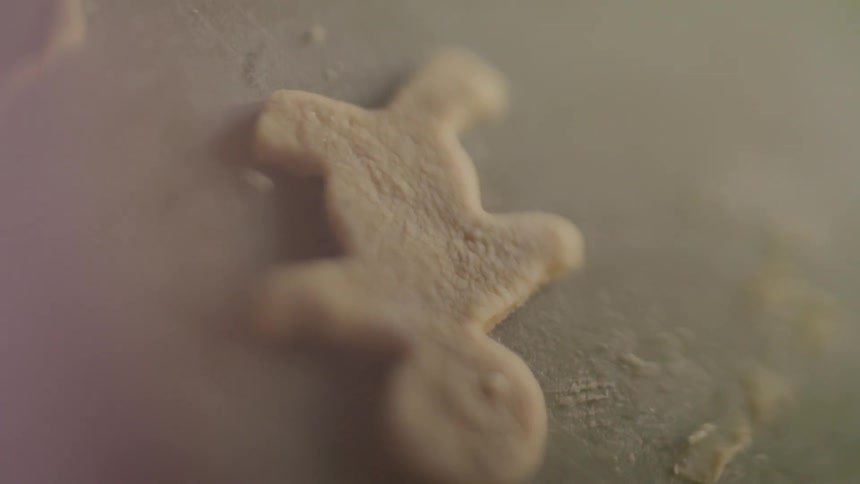 A cookie is cut in the dough