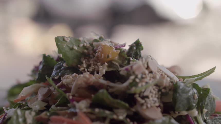 A salad is served on a plate