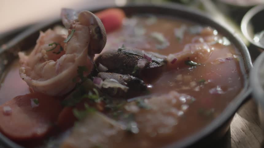 Meaty soup in a pot indoors