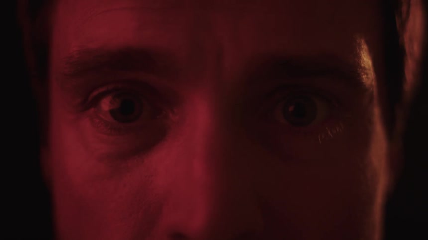 The man in the dark looks nervous