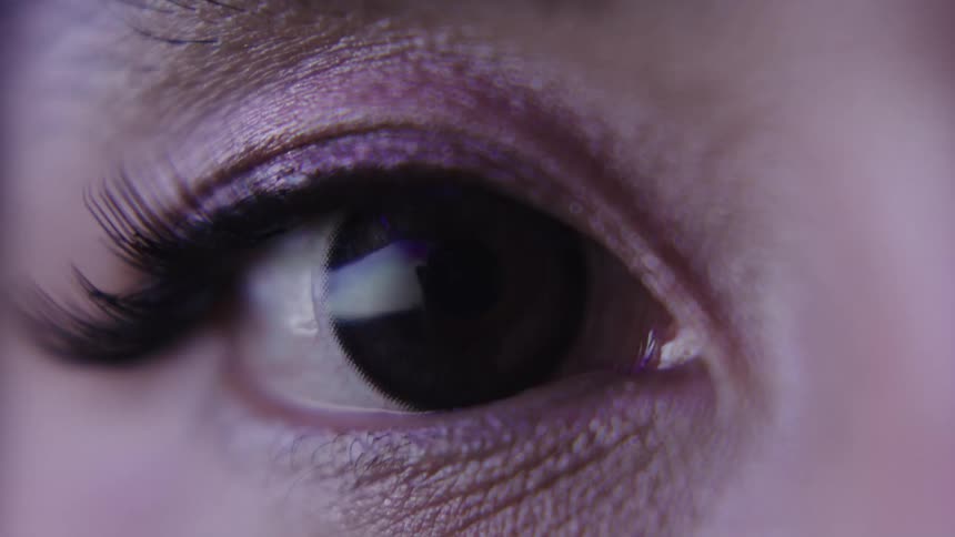 Light is flashing on the womans eye