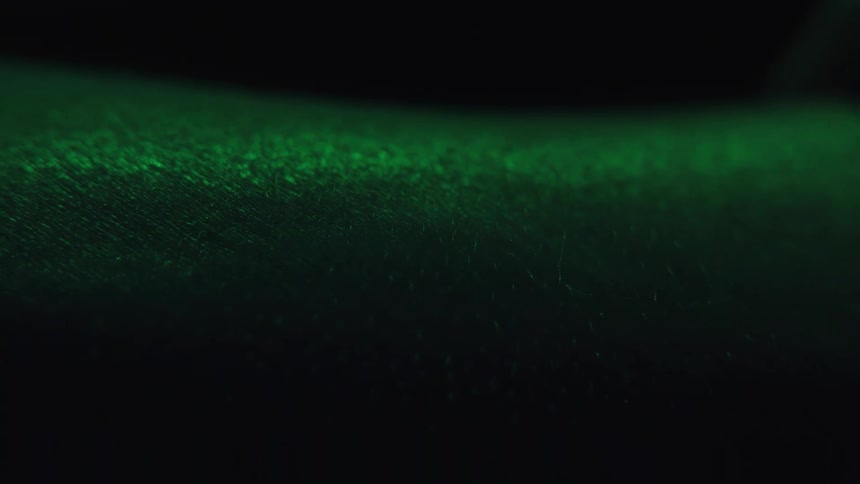 Closeup of skin texture illuminated by green light