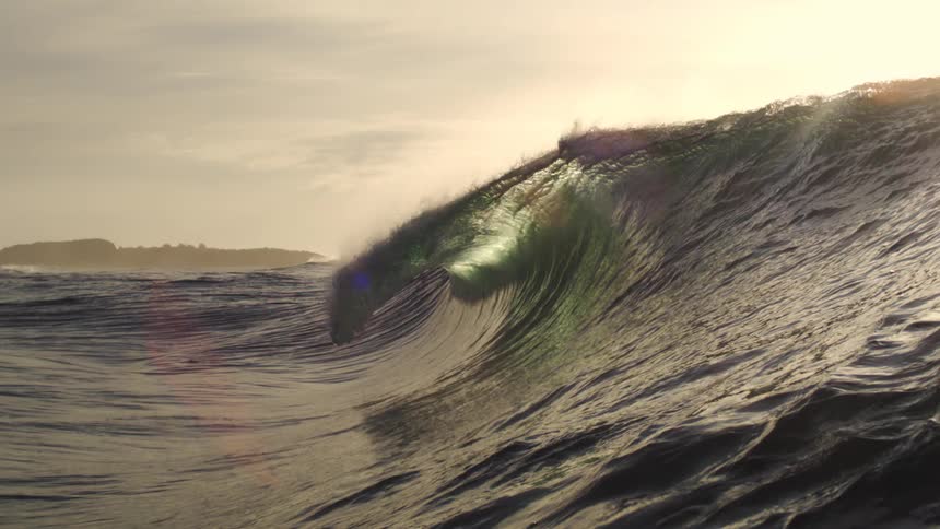 Barrel wave crashing in the wave in slow motion