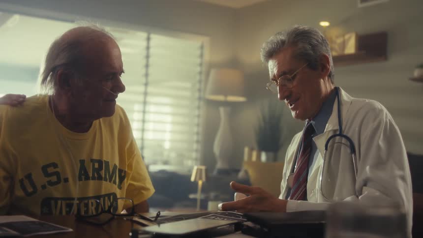 A doctor conducts a health checkup at home on an elderly patient