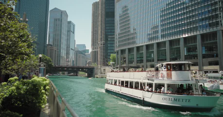 The ferry transports many people on the canal in the city