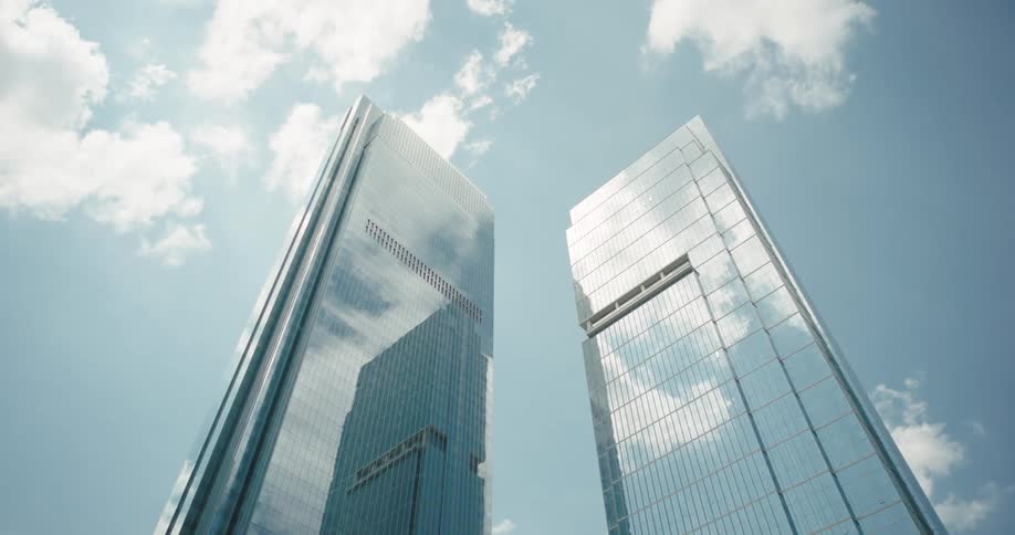 A city skyline with tall buildings against the sky