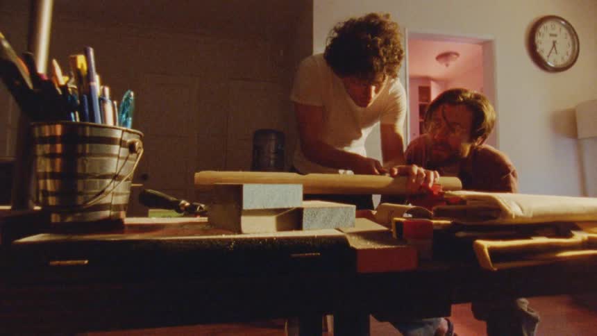 Two people woodwork at home