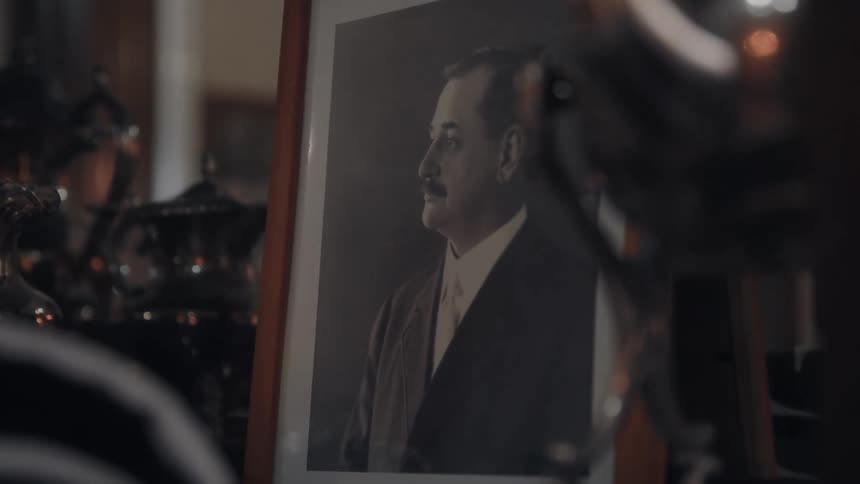 Photograph of a man framed in a picture frame
