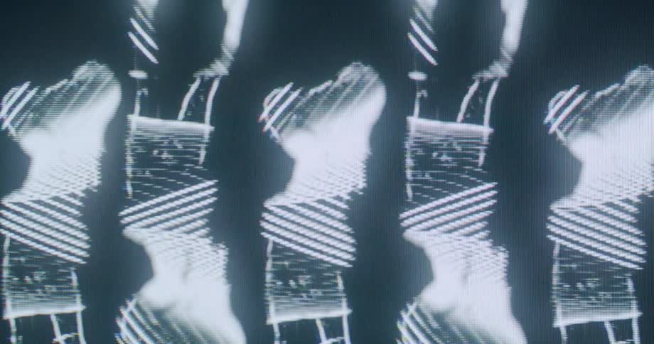 Outlines of multiple women dancing is on the hologram