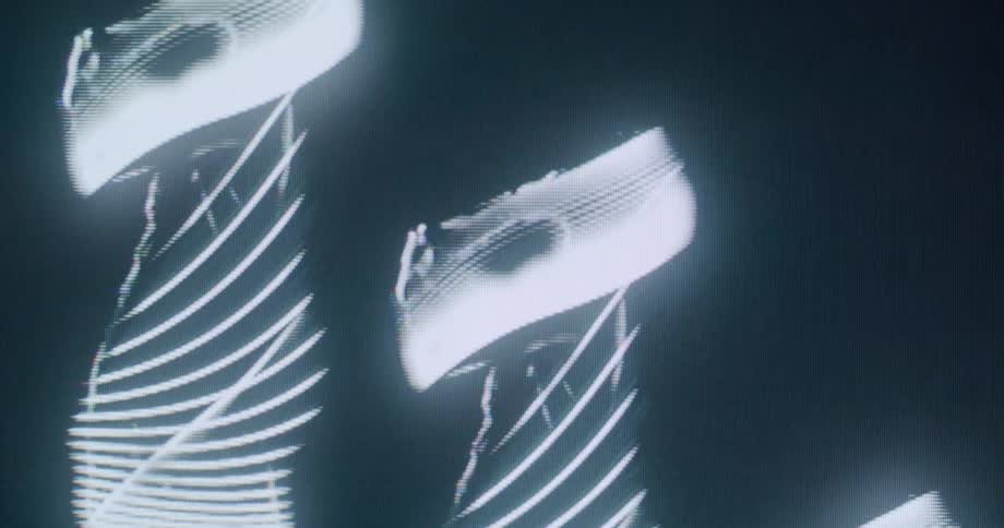 The hologram is of outlines of women dancing and turning