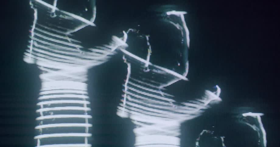 Women dance together in the black and white hologram