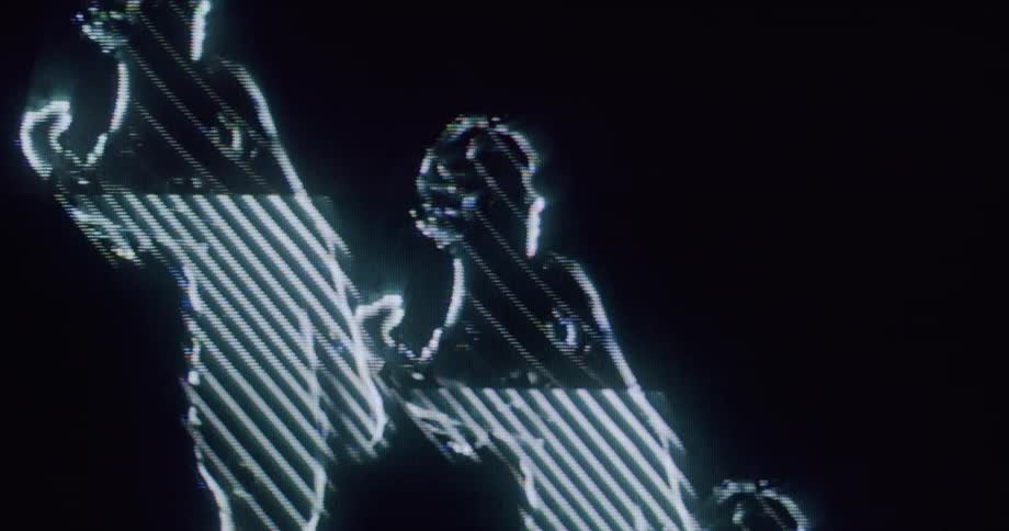 The silhouette of a woman dancing is modified with digital effects