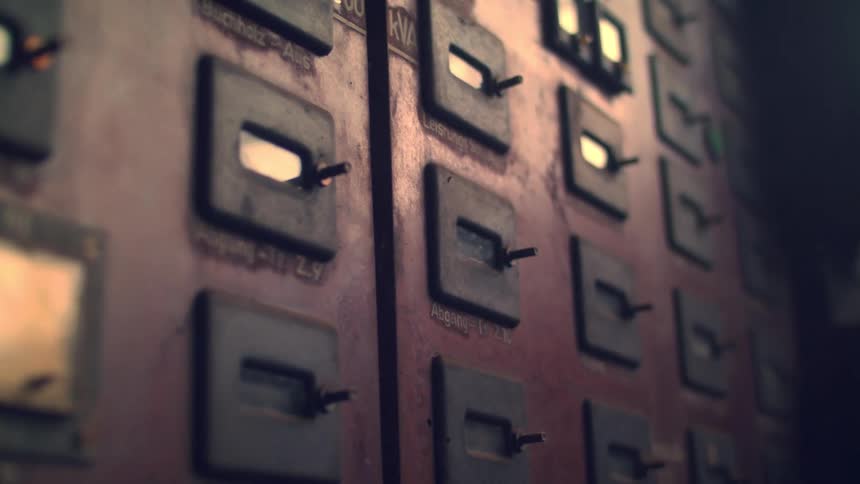 Closeup of old control panel with switches and gauges