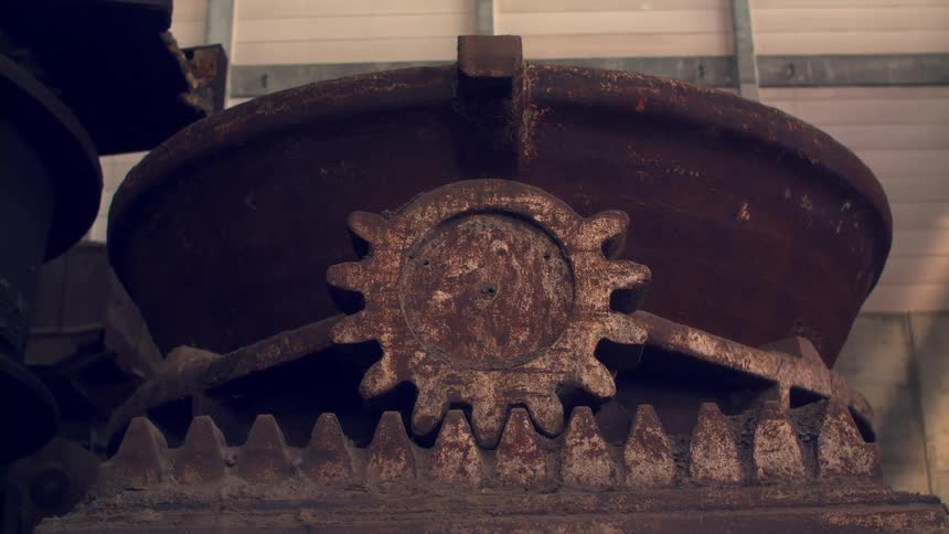 Rusty gear of an industrial machine in detail