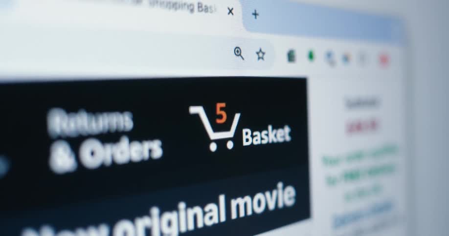 The video shows a computer screen with a browser window open to an ecommerce website a cursor hovers over the shopping basket icon and the number of items in the cart rapidly increases from one to eight