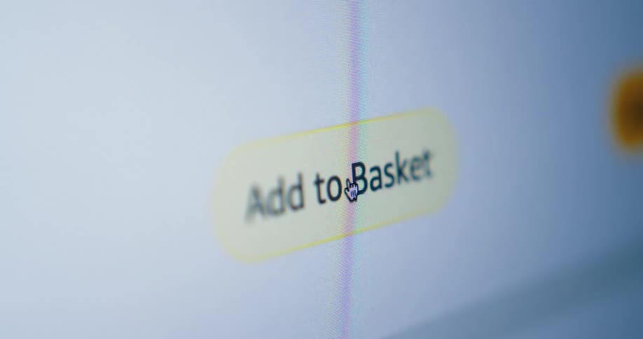 Online shopping screen shows confirmation of item added to basket