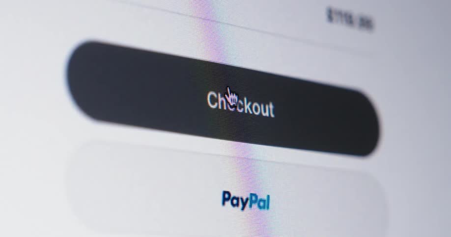 Computer screen showing a purchase being made as cursor moves to and clicks the checkout tab