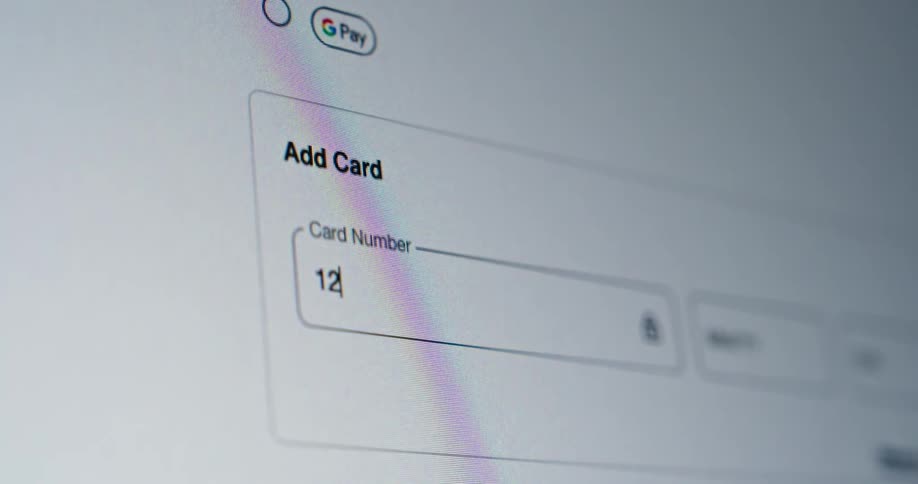 An online form shows a card number field ready to add a payment