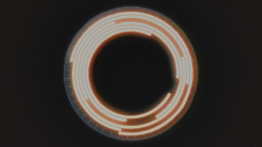 Concentric yellow and orange open circles moving around inside each other