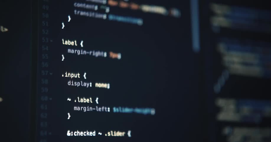 Computer code scrolls on the screen
