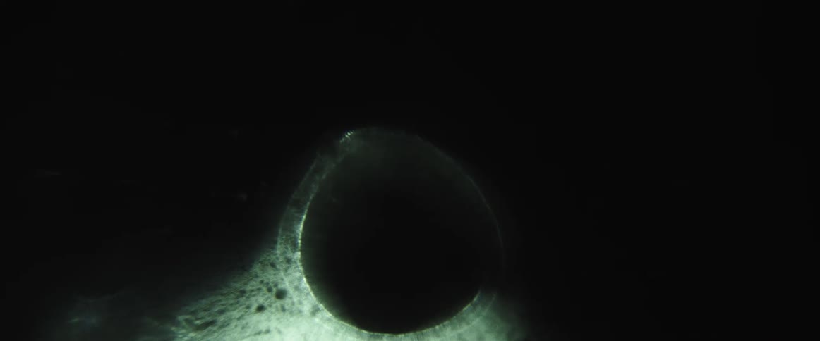 Closeup of a light in abstract liquid