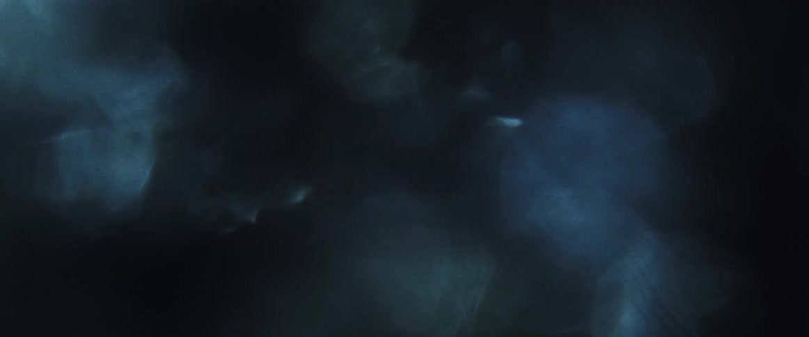 Reflections and abstract shapes in shades of blue and white create an ethereal effect