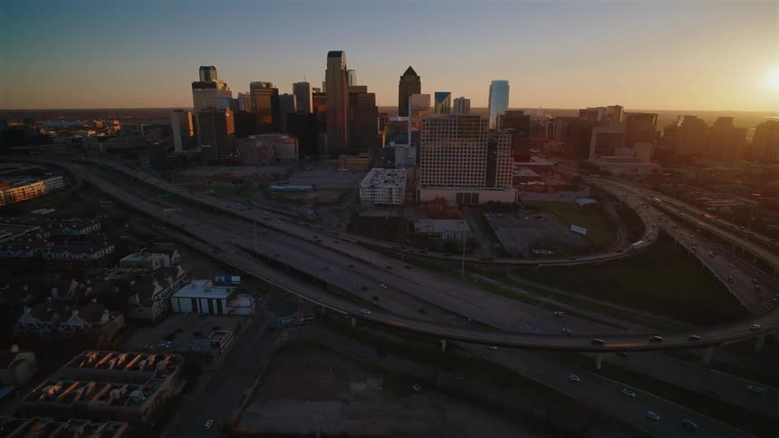 The traffic is running into the city at sunrise