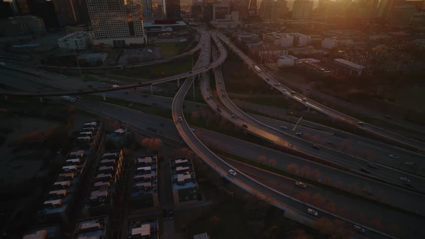 The sun is rising on the big city