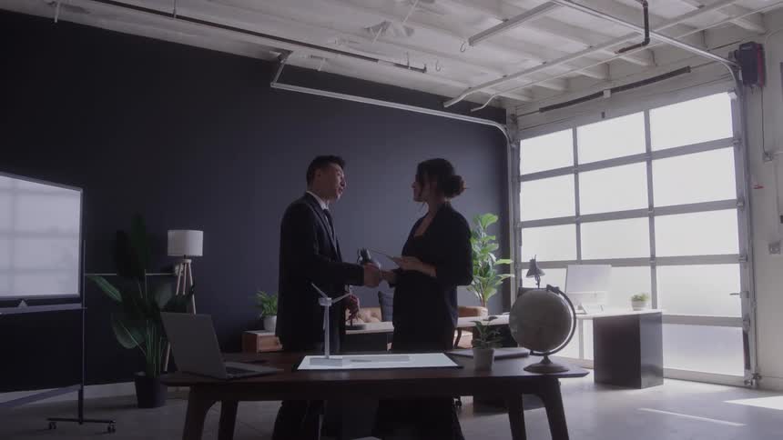 Meeting between two professionals in a modern office