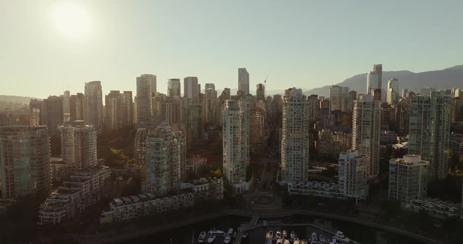 Aerial view of a city skyline at sunset