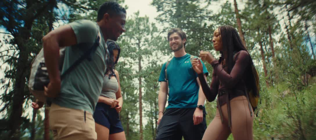Friends talk on the hiking trail