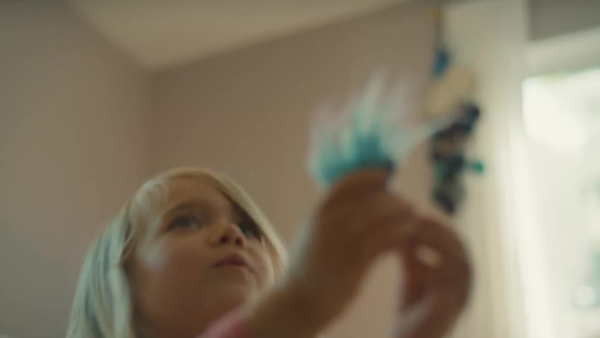 Little girl playing in the room