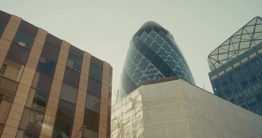 The sunlight reflects off the buildings