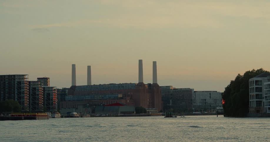 Battersea power station in london seen from the river at dusk