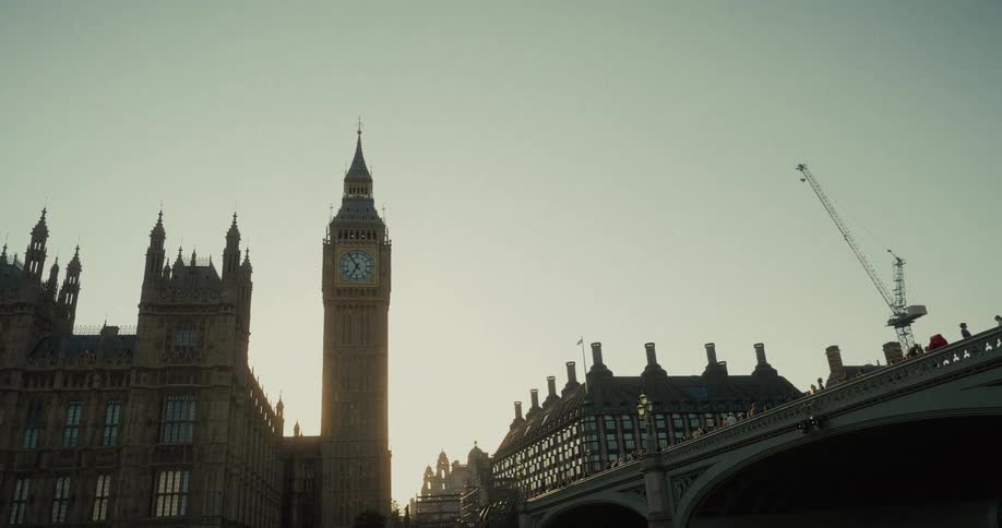 Sun sets behind big ben and the houses of parliament in london
