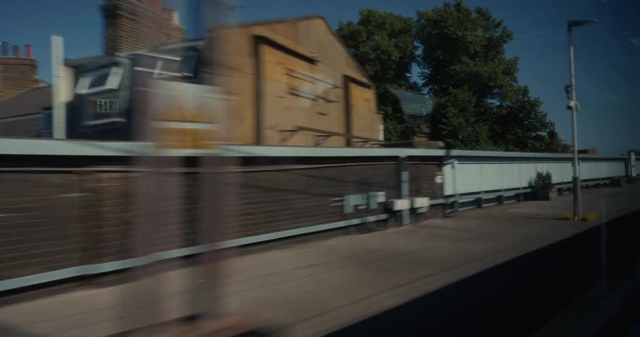 Riding on a subway looking out the window