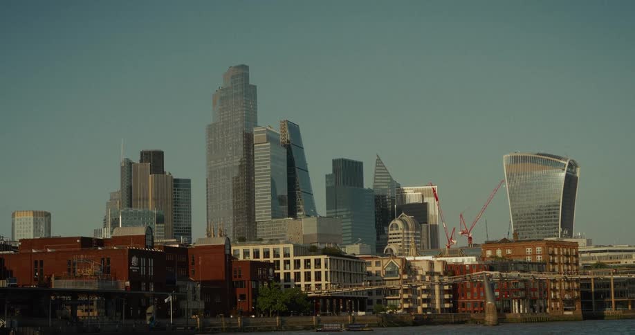 London skyline blends modern glass skyscrapers with historic riverside buildings