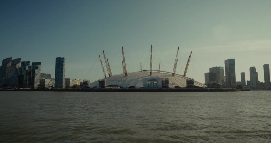O2 arena surrounded by modern buildings on the riverside in london