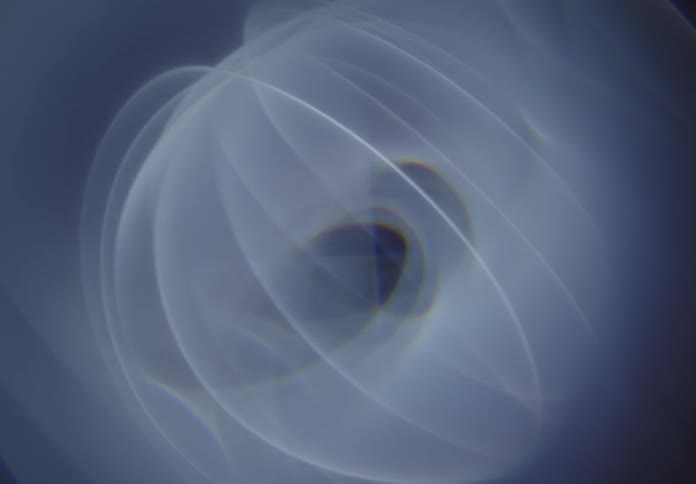 A circular object spins counterclockwise