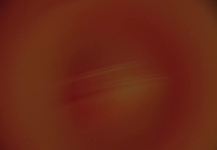 Circular shades of red and orange create an abstract pattern