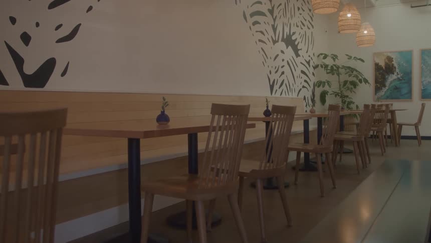 The restaurant is full of empty tables