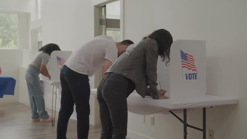 People are voting at the voting booths